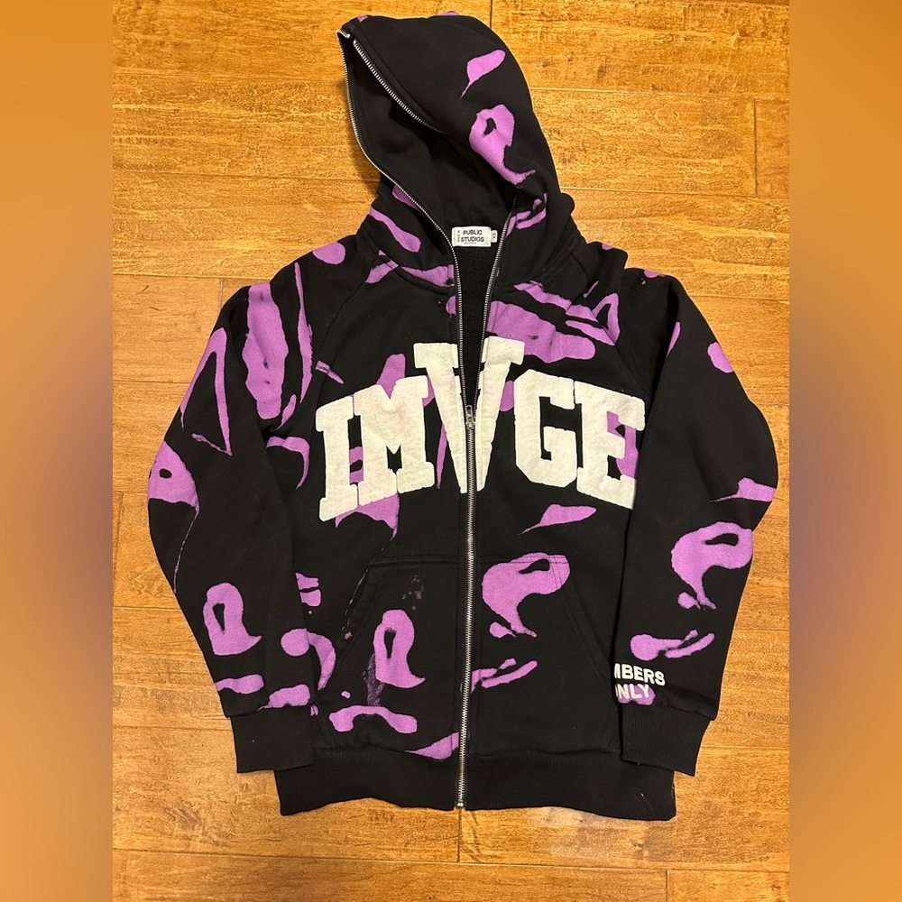 Public studio zip up